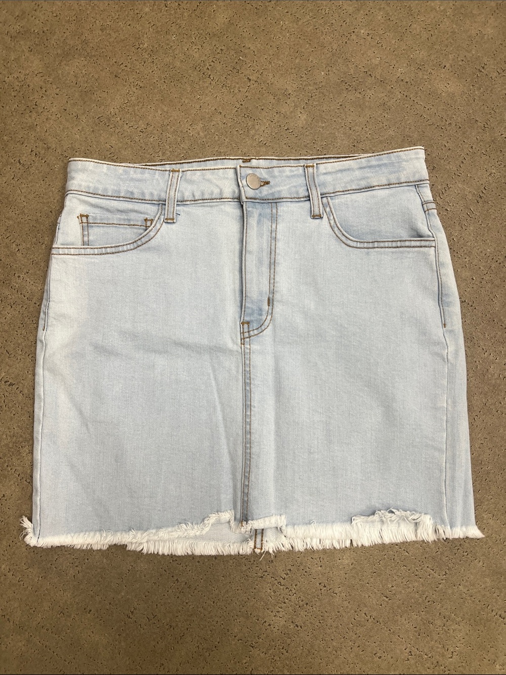 Light Blue Denim Mini Skirt with Frayed Hem